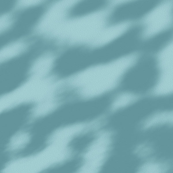 a blurry photo of a light blue background