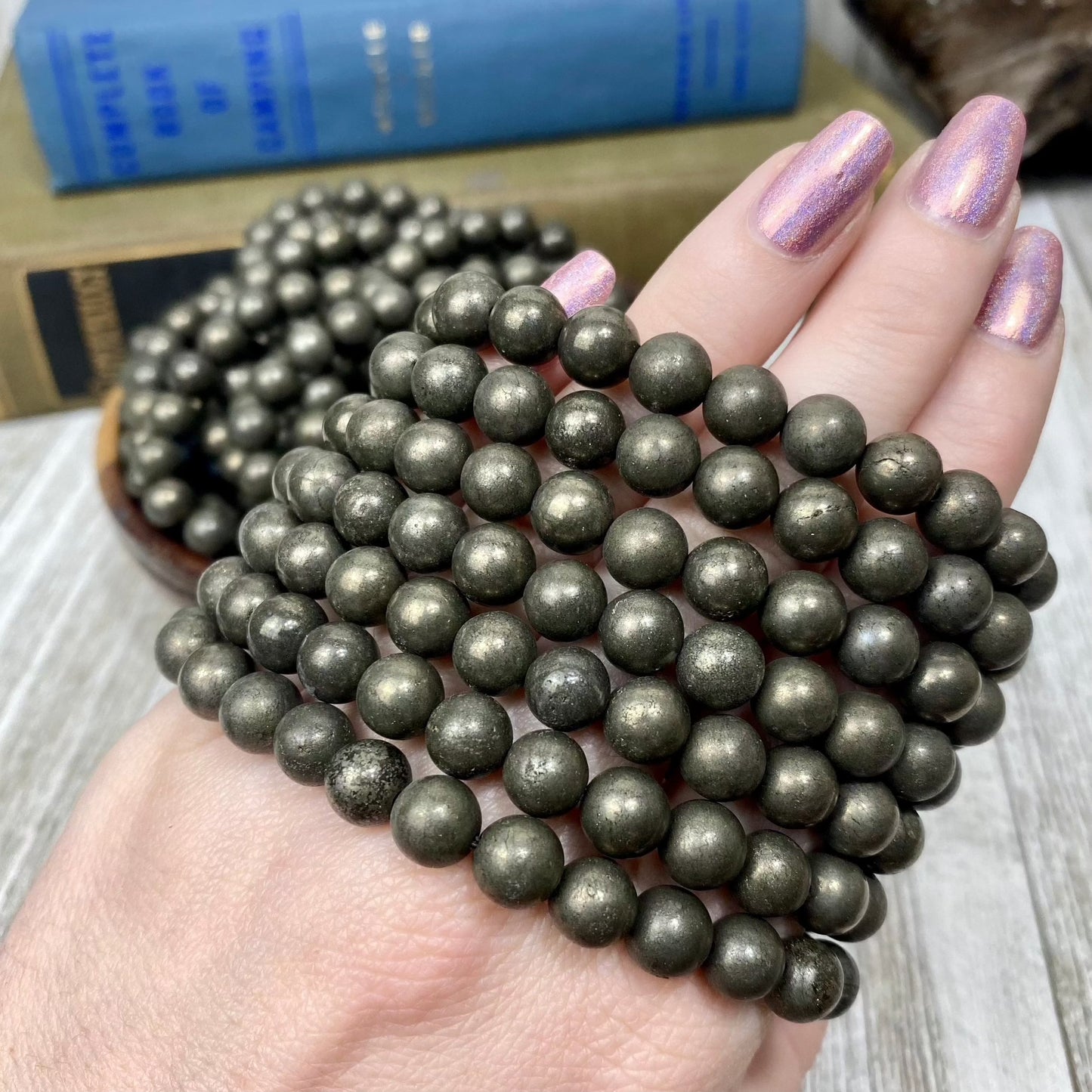 Pyrite 8mm Round Bead Crystal Bracelet